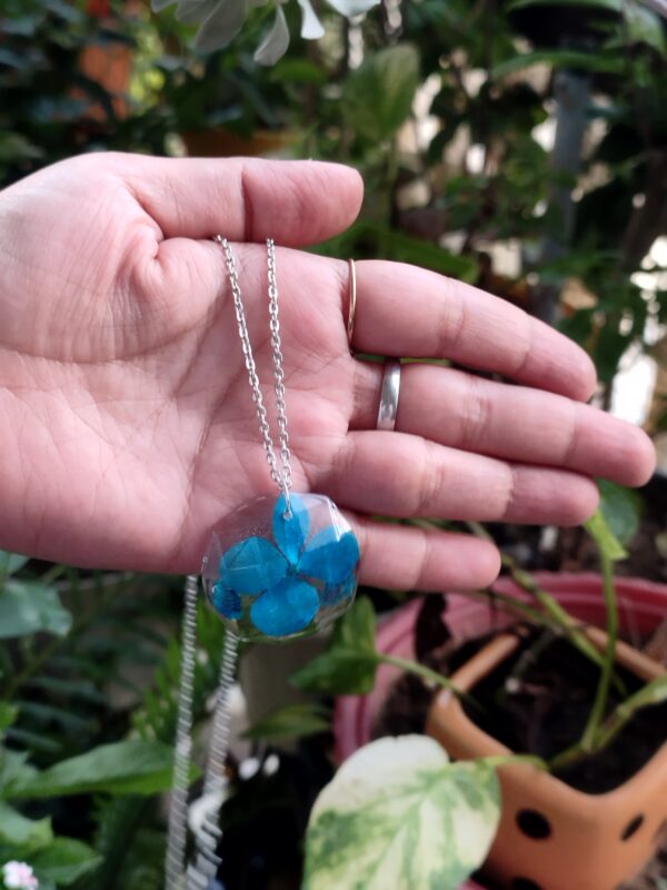 Elegance Encased in Resin - Resin and Metal Pendant